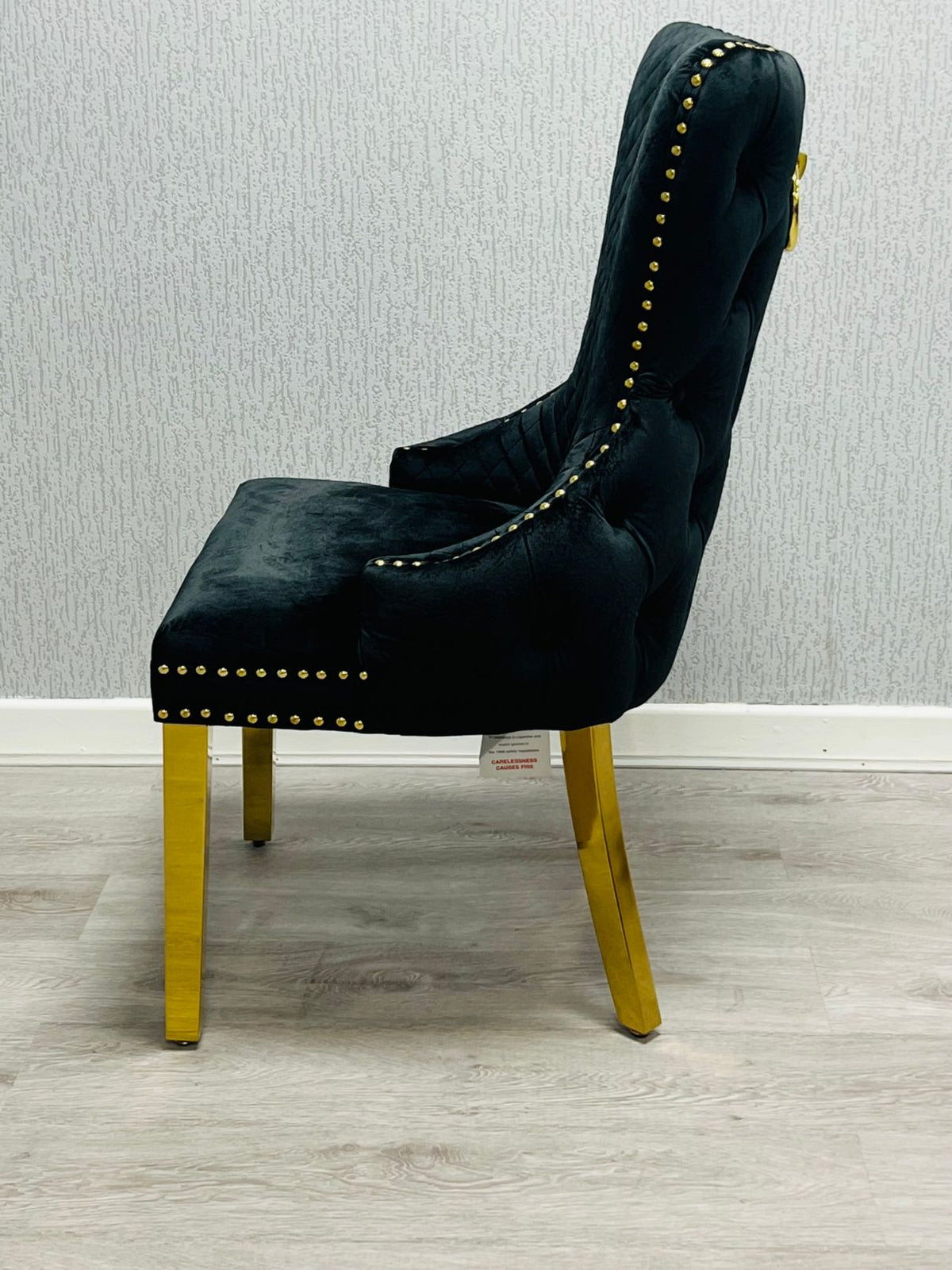 Sofia Black & Gold Marble Dining Table with Victoria Lion Knocker Chairs