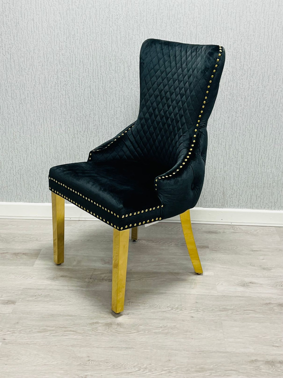 Sofia Black & Gold Marble Dining Table with Victoria Lion Knocker Chairs